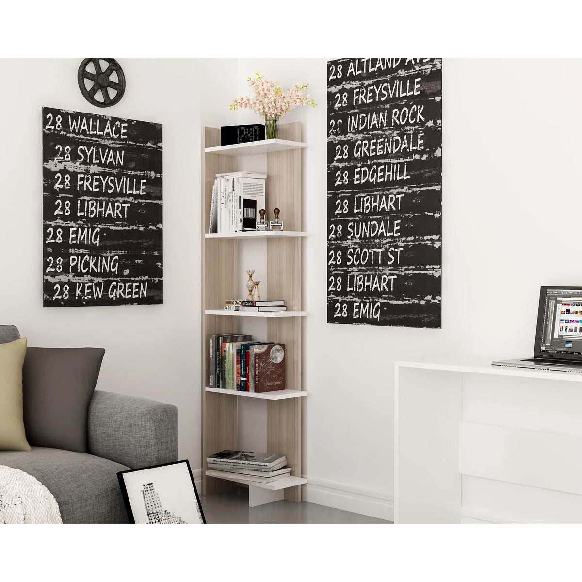 White corner bookcase styled with books plants and decor